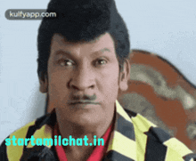 a close up of a man 's face with the words starttamilchat.in written below him