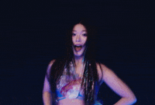 a group of young women are dancing on a stage