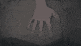 a person 's hand is reaching out to touch a blue lightning bolt