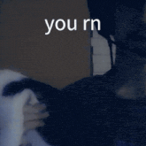 a blurred image of a person with the words you rn written above them