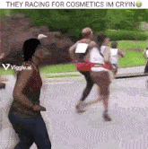 a woman is standing in front of a group of runners with the caption they racing for cosmetics im cryin