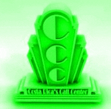 a green trophy with the letter c on it is on a white surface .