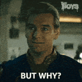 a man in a blue jacket says but why .