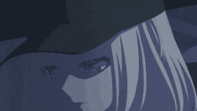a close up of a girl wearing a baseball cap