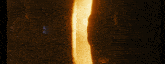 a close up of a person 's feet in a burning area