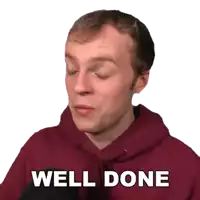 a man wearing a red hoodie with well done written on it