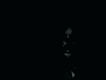 a black and white photo of a person 's face with a x on it