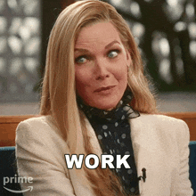 a woman in a white jacket says work