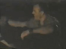 a close up of a painting of a person holding a piece of cloth in their hands .