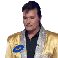 a man wearing a gold jacket with a name tag that says allan