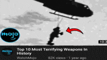 a video titled top 10 most terrifying weapons in history shows a man hanging from a helicopter