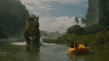 a group of people in a raft are being attacked by a large dinosaur