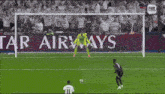 a soccer game is being played in front of a sign for tar airways