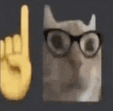 a cat wearing glasses and a yellow hand making a rock sign .