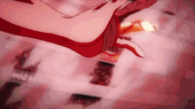 a woman in a red dress is flying through the air with a red background .