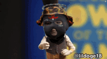 a doll wearing a mask and a top hat with the name lildoge18 on the bottom right