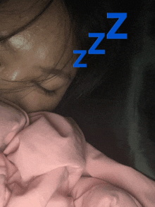 a woman sleeping with the letters zzz above her