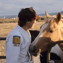 Kissing The Horse Danny Mullen GIF - Kissing The Horse Danny Mullen Animal Lover GIFs