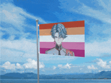a flag with a picture of a man on it flying in the wind