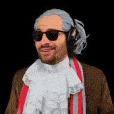 a man wearing a wig and sunglasses has headphones on