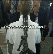 a boy with a drawing of michael jordan on the back of his shirt