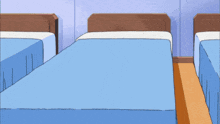a person wearing a watch with the number 8 on it is standing next to a bed