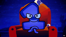 a blue cartoon character is sitting in a red chair with a star on it