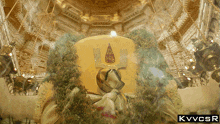 a picture of a temple with the letters kvvcsr on the bottom right