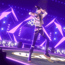 a person is dancing on a stage with purple lights and a sign that says ' a ' on it