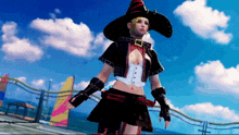 a woman in a witch costume stands in front of a sailboat