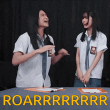 two girls in school uniforms are laughing with the words roarrrrrr in yellow letters
