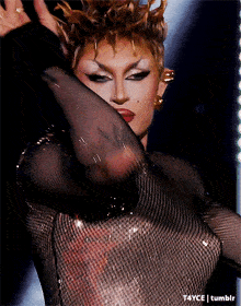 a close up of a drag queen 's face with t4yce tumblr written in the corner