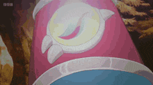 a close up of a pink and white object with the bbc logo in the corner