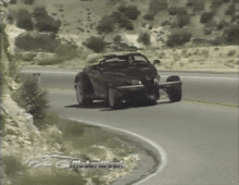 a car is driving down a road with a caption that says ' motor week '