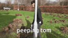 Peeping Tom James GIF