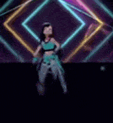 a blurred image of a woman dancing in front of a crowd