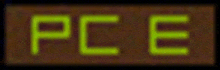 a sign that says pce in green letters