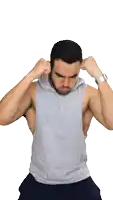 a man wearing a sleeveless hoodie has a tattoo on his arm that says ' i love you '