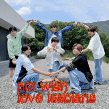 a group of young men are posing for a picture with the words " not wish love lesbians " in red