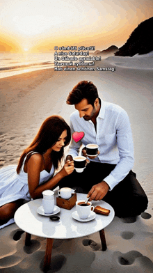 a man and a woman are sitting at a table with cups of coffee on it