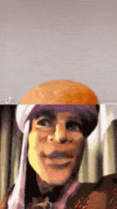 a man wearing a turban and a hat is smiling