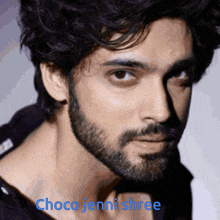 a close up of a man 's face with the name choco jenni shree on the bottom