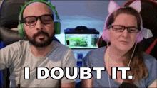 a man and a woman wearing headphones are sitting next to each other and the woman is wearing cat ears .