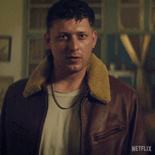 a man wearing a leather jacket is asking if there is a difference