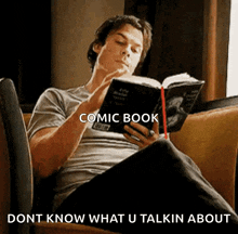 Damon Salvatore Reading A Book Of50shades Of Gray GIF - Damon Salvatore Reading A Book Of50shades Of Gray The Vampire Diaries GIFs