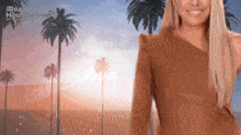a woman is standing in front of palm trees and the words real housewives