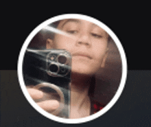a woman is taking a selfie with her phone in a circle