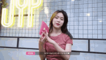 a girl in a red and white striped shirt with the name ryujin on the bottom right