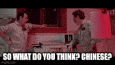 two men are standing in a kitchen and one of them is asking the other what do you think ? chinese .