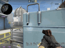 a person is holding a gun in front of a box that says $ 3,900